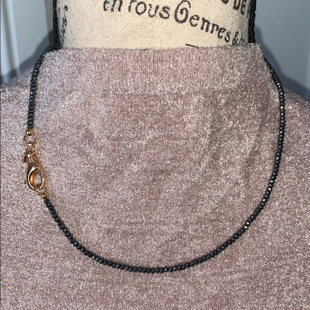 Hematite bead necklace with rose gold tone clasp